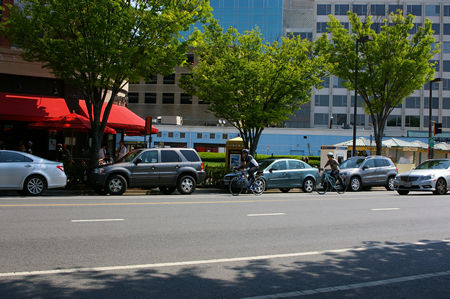 Bicyclists riding in bike lanes on Woodmont Ave.