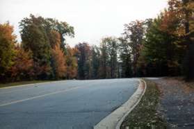 Turn right at Center Harbor Rd and follow the wide asphalt trail along that road.