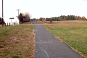 Turn right onto the wide asphalt trail adjacent to Baron Cameron Av.