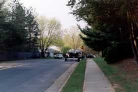 Take the sidewalk along Green Wy until Oak Ladder Ct.