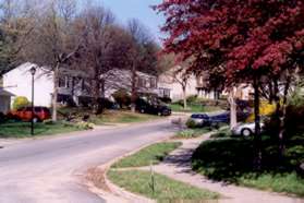 Turn right at the first street (Mantle Rd) and follow the sidewalk past 2 homes on the left.