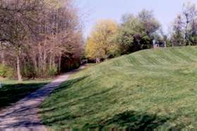 Homes should be on the left and the school grounds on the right.