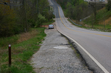 Walk on the shoulder of Hooes Rd. about 1 block to the first trail on the left. To take the alternate route continue past the bridge over Pohick Creek and take the first trail to the left. Go to step 21 for the alternate route.