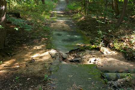 Water from the June 2006 floods washed out part of the trail here. It is passable but bicyclists should be careful here.