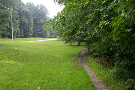 Hunter Village Dr. can be seen on the left from this section of the trail.