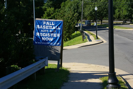 Turn left and walk down the parking lot entrance road for Thaiss Park.