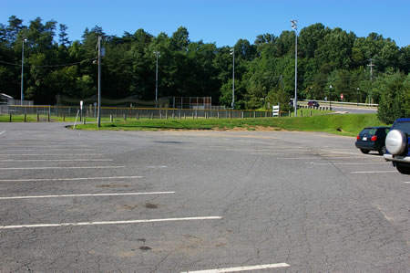 Walkers from the previous section of the CCT should turn left into the parking lot and follow the entrance road to the street.