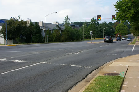 At the intersection of Blake La. and Jermantown Rd. turn left to cross Blake La, then right to cross Trevor House Dr. 