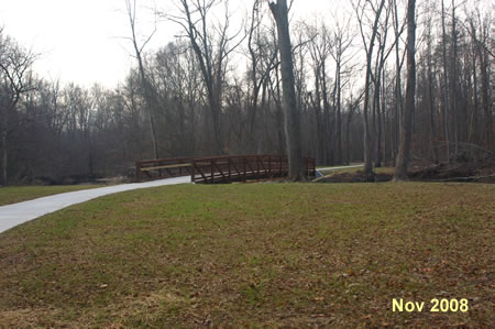 The trail crosses a bridge over Accotink Creek.