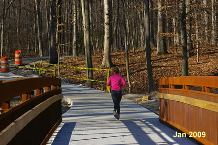 The trail goes up a short hill after crossing the bridge.