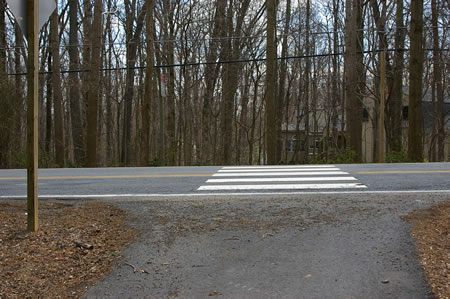 The trail crosses Lawyers Rd.