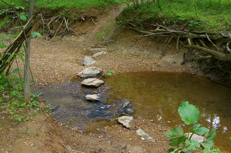 This section of the CCT ends at this crossing of Rocky Branch.