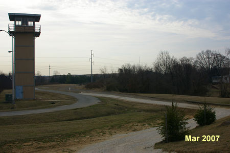 Follow the gravel trail towards the watch tower.