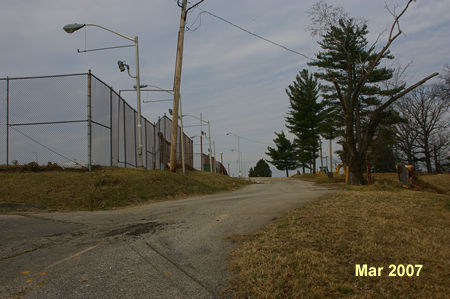 Follow the prison road with the fence on your left.