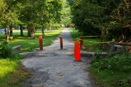 This crossing was damaged by the flooding in June 2006. It is passable.