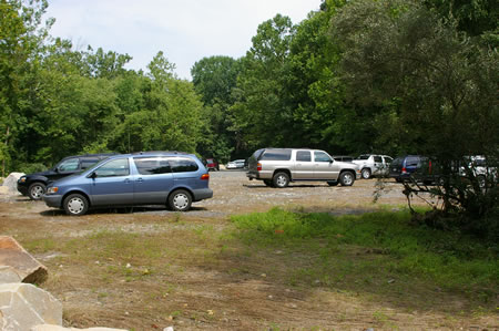 The trail reaches the end of the Camelot Pool parking area.