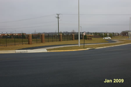 The trail crosses White Spruce Way and turns right to reach Silverbrook Road.