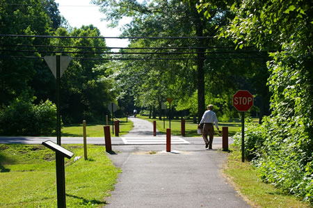 This section of the walk ends here at Prosperity Ave. To continue on the next section follow the trail across that street.