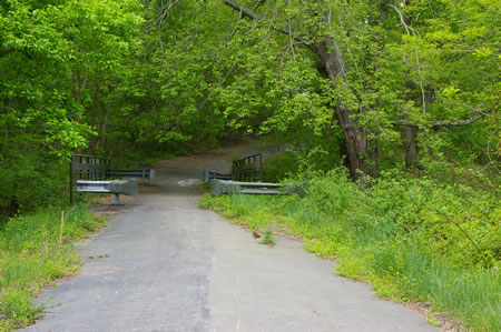 The CCT crosses Difficult Run on the old Vale Rd. bridge. Vale Rd. was realigned in this section.