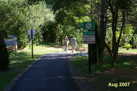 Take the asphalt trail on  the northeast side of the intersection going down the hill.