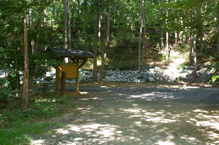 After crossing the bridge turn left at the first intersecting trail.