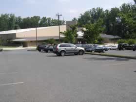 Park in the parking lot in front of the indoor ice rink.