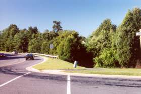 The alternate routes merge and follow the asphalt trail along Bennington Woods Rd at Walnut Branch Rd.