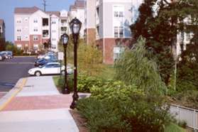 Turn right where the trail intersects the sidewalk.