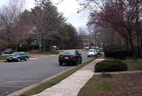 Turn right at Charterhouse Circle and follow the sidewalk along the right side of that street.