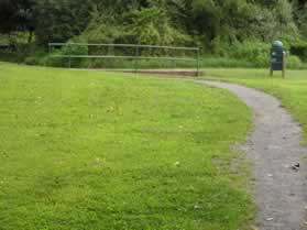 Turn right onto the bridge just before the trail leaves the park.