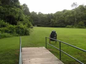 After crossing the bridge stay along the edge of the park until reaching the far diagonal side.