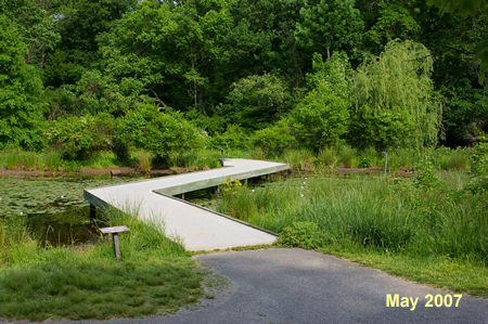 The walk starts at the parking area at Walney Pond. Take the bridge across the pond.