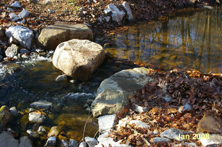 The rocks at the crossing are some distance apart and are not suitable for small children .