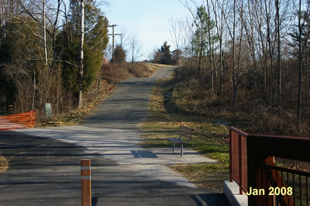 After crossing the bridge take the trail to the right up the hill.