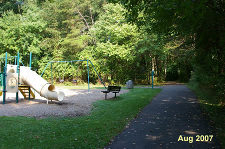 Turn left onto the asphalt trail just past the playground equipment.