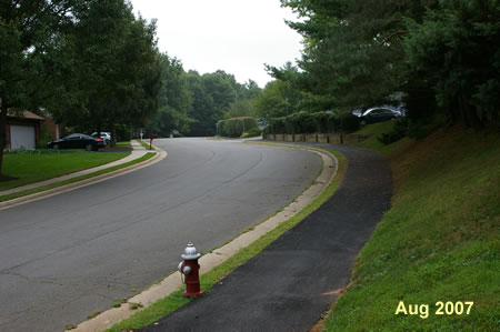 The trail turns right to follow Timberhead Ln.