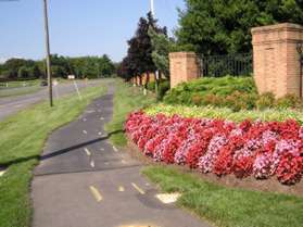 Turn right at the corner of Baron Cameron Av. and follow the asphalt trail along that road.