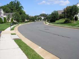 Turn left at Aldbury Way and follow the sidewalk along the left side of that road.