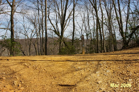 The trail intersects with the Ridge Trail at the top of the hill.