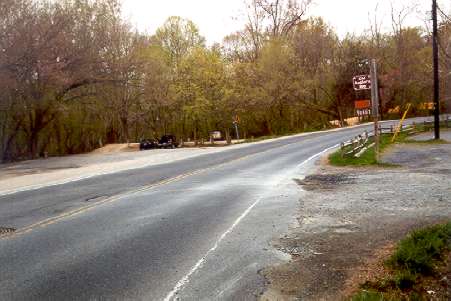 Turn left into the parking lot opposite the Anglers Inn.