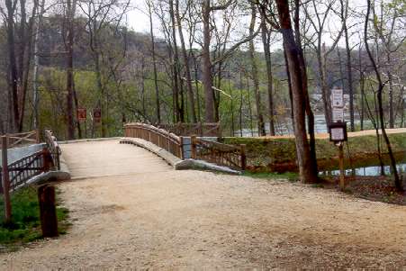 Turn left and cross the bridge over the canal.