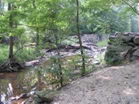 This is a view of the upper guard gate from the north.  Notice the spillway to the left of the guard gate.