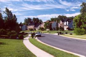 Turn left onto Old Hunt Way and follow the sidewalk for one block.