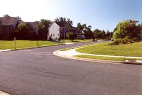 Turn right at Crest Dr and follow the sidewalk for one block along that street.