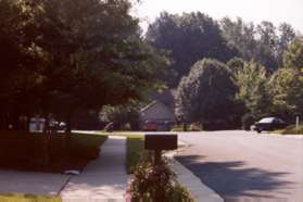 The trail intersects with Lake Newport Rd.  Turn right and follow the sidewalk on the other side.