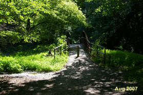 The trail crosses a bridge over Accotink Creek.