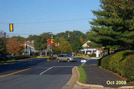 Twin Branches Rd. intersects with South Lakes Dr.  You can either cross South Lakes Dr. here to end the walk or turn right to reach a tunnel under that road.