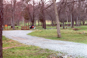 After a short distance cross a pedestrian bridge and follow the gravel trail on the other side.