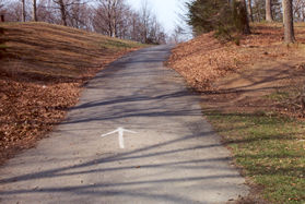 After crossing the dam the trail climbs a hill.