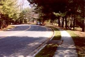 Turn right and follow the sidewalk along North Shore Dr.